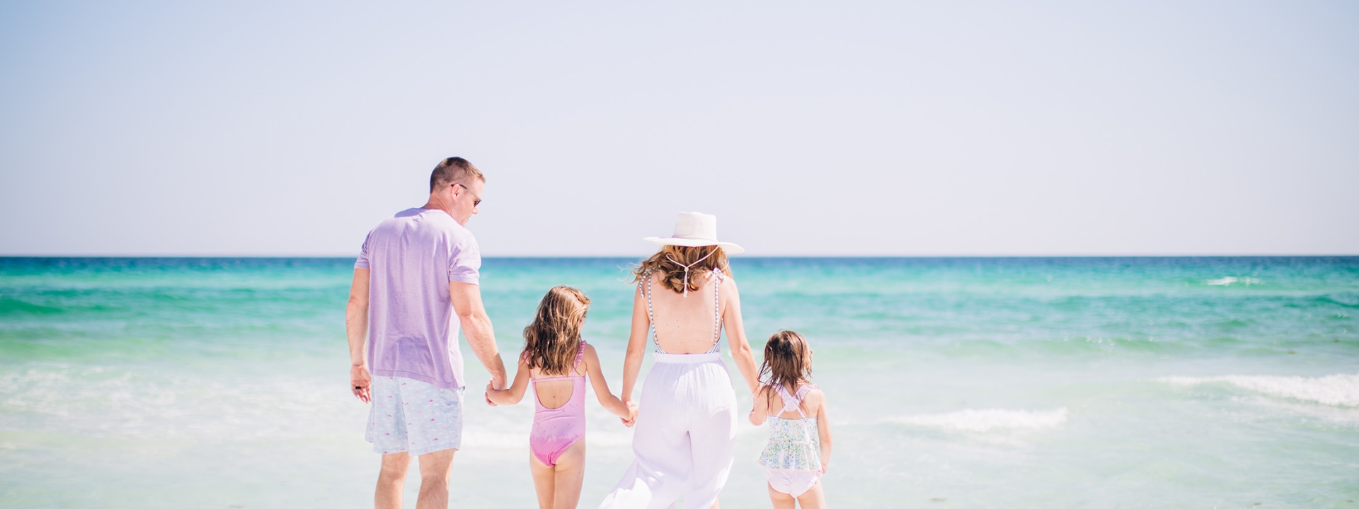 Family walking on the beach